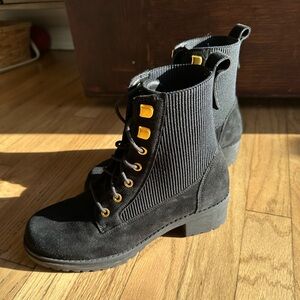 Cole Haan waterproof boot with gold details. Can dress up or down. Worn twice. ￼